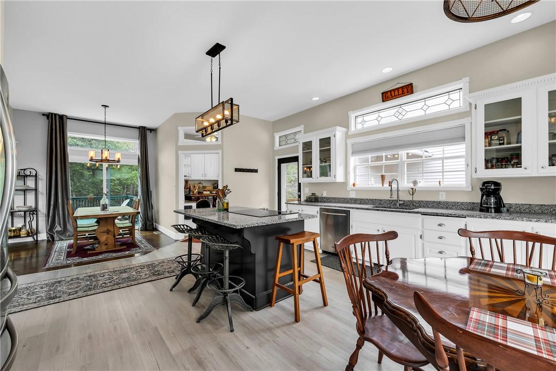 Image 4: The kitchen is the heart of the home, and the whol