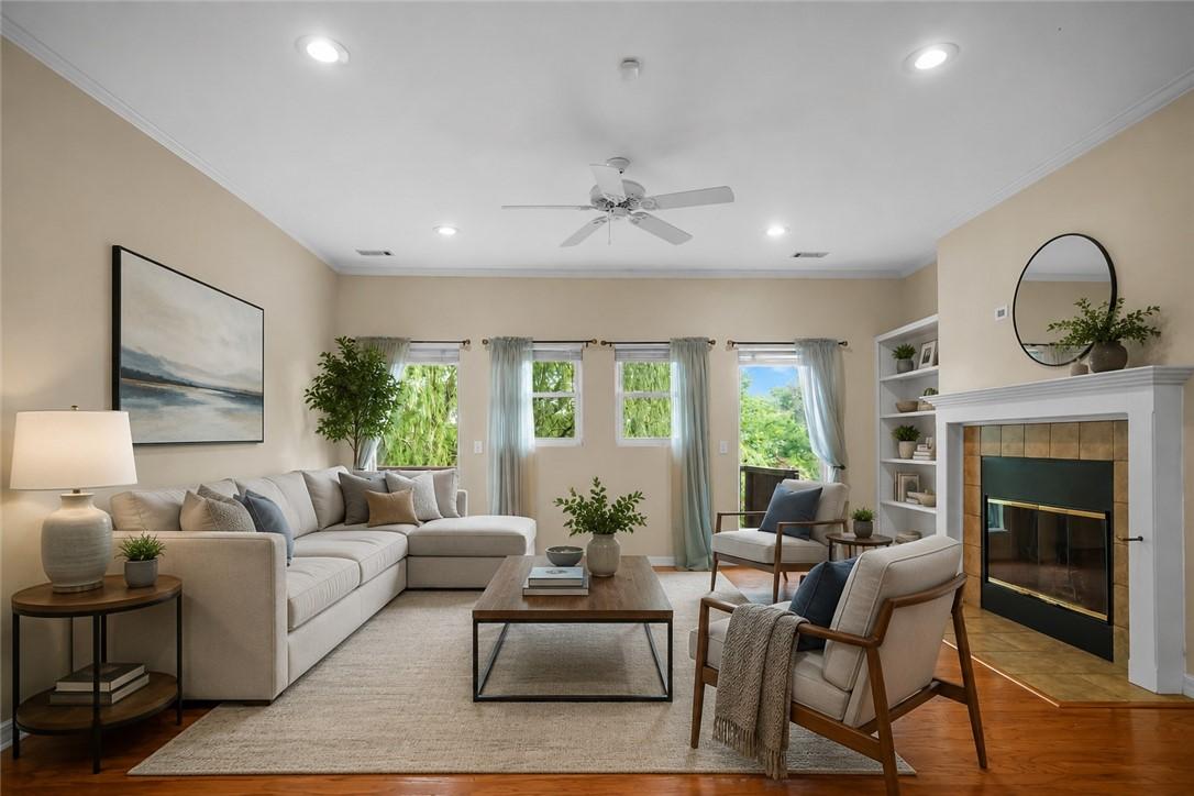 Image 3: Living area featuring wood-finish flooring, recess