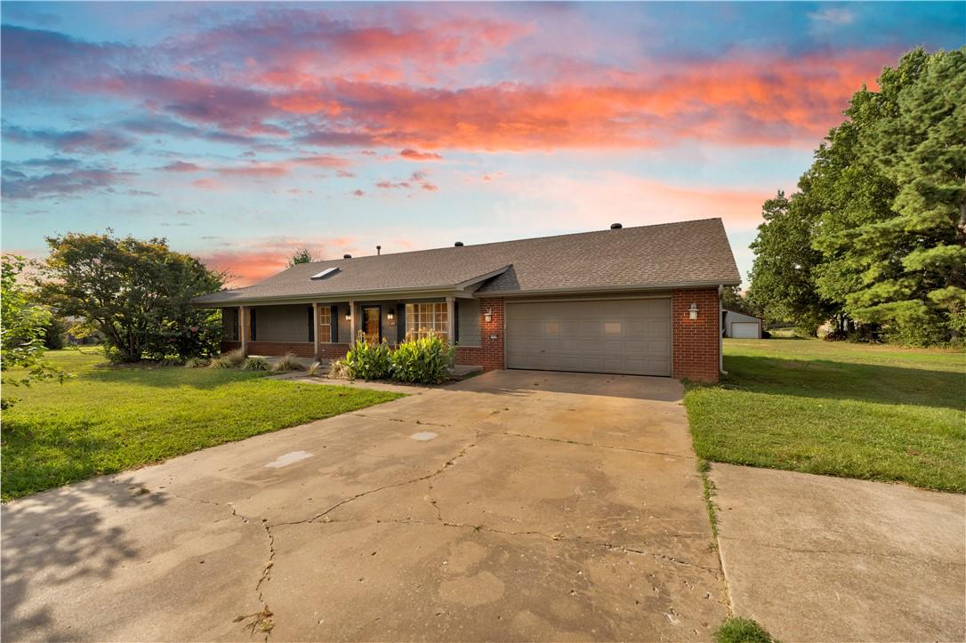 Image 2: Ranch-style residence featuring brick siding, a co