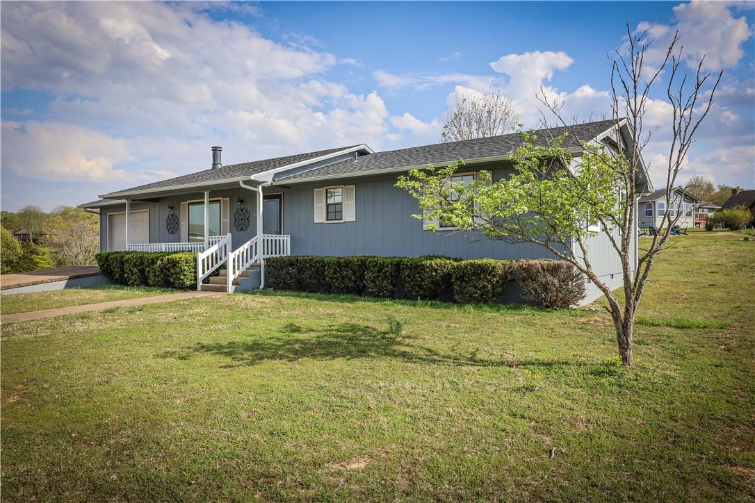 Image 3: The property offers  a ranch-style home with one c