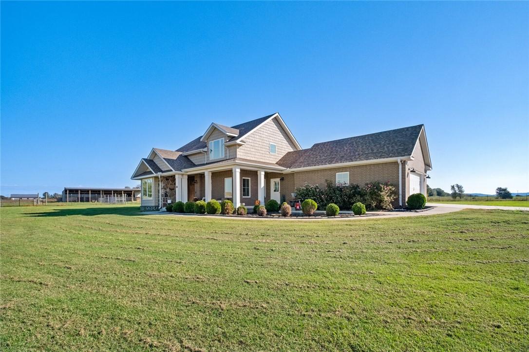 Image 2: View of front of property featuring a front yard,