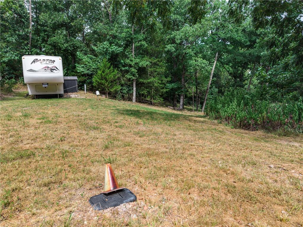 Image 4: Wooded lot featuring mature trees
