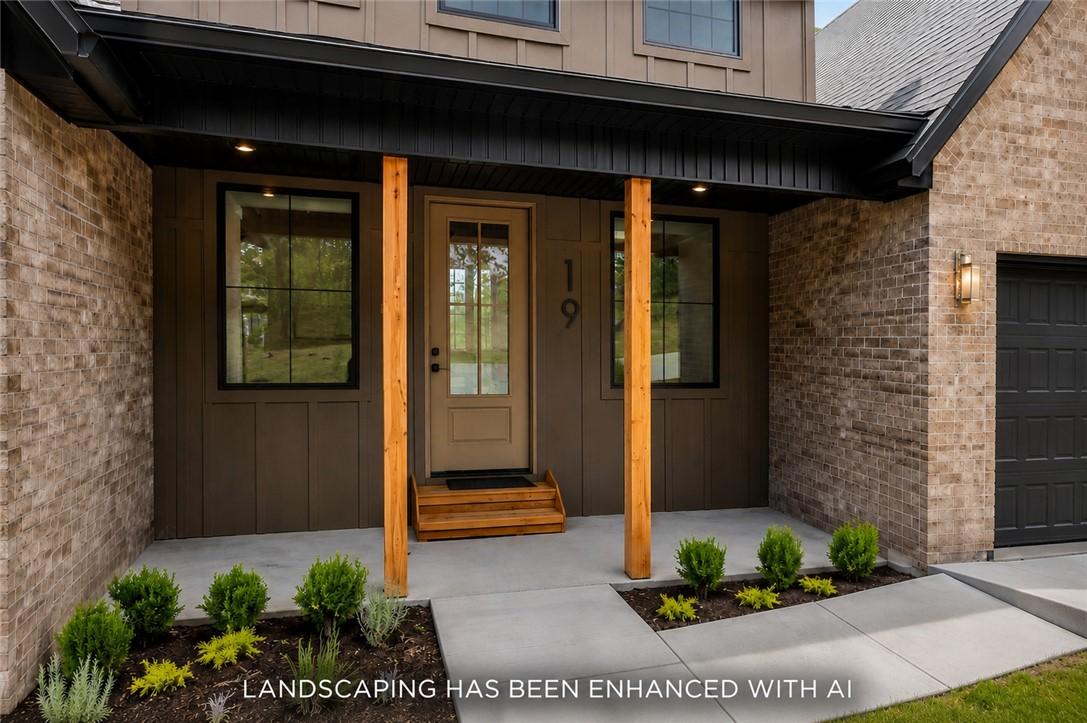 Image 2: Covered entry featuring wood posts, recessed light