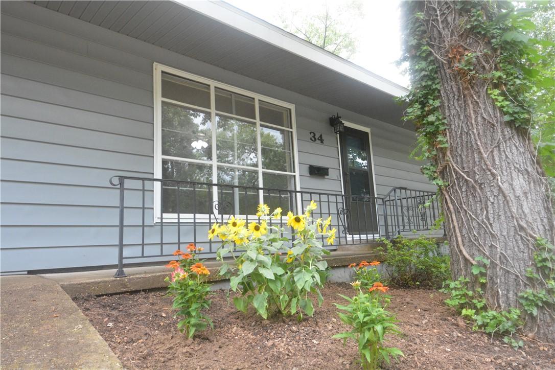 Image 3: Light blue siding exterior featuring a prominent f