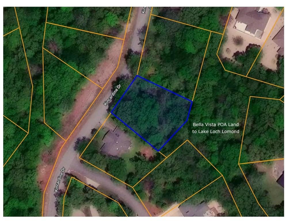 Image 2: Aerial overview of property's location featuring p