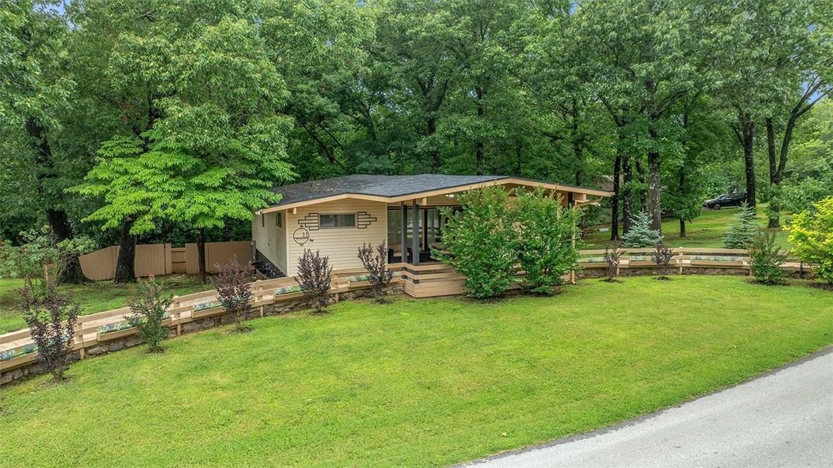 Image 3: Single-story residence featuring a covered front p