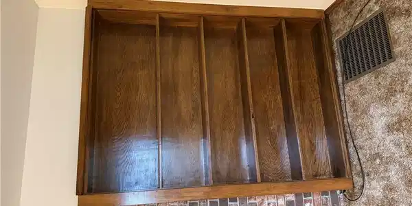 Image 4: Built-in wood-finish shelving unit featuring five