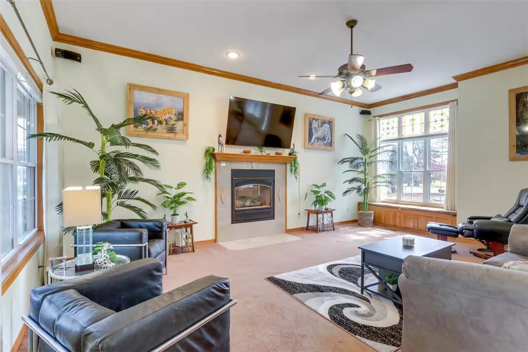 Image 3: Living Room with gas insert fireplace.