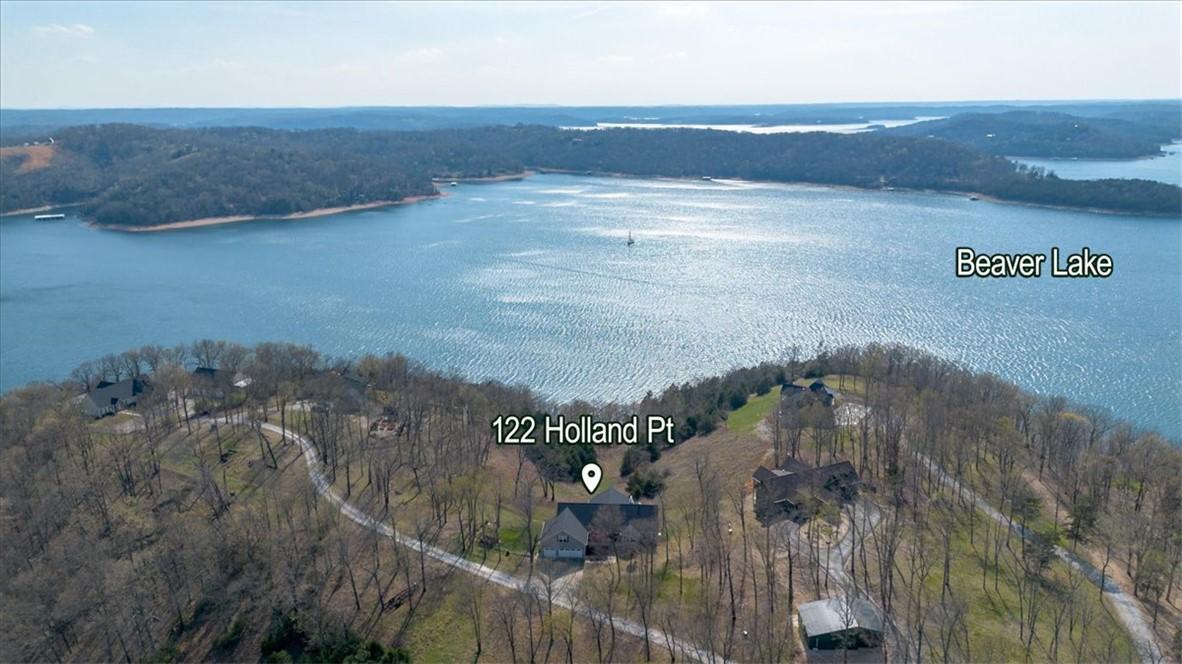 Image 2: Aerial view of the house overlooking Beaver Lake