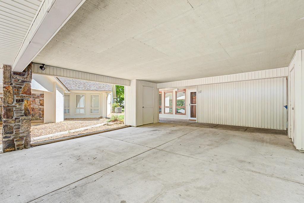 Image 4: Spacious covered 2 car parking area with concrete