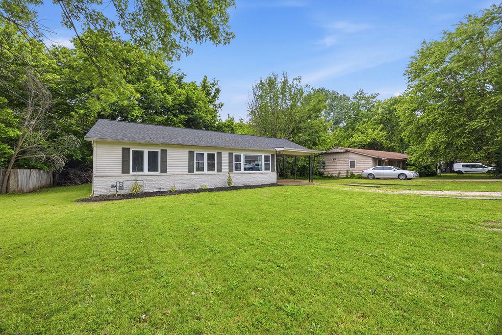 Image 2: Ranch-style residence featuring a combination of s