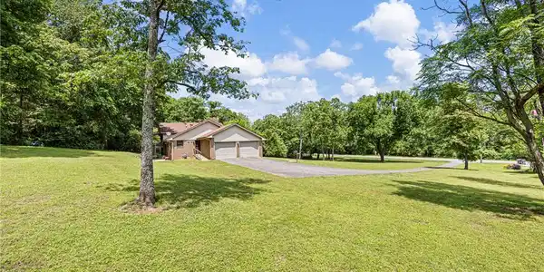 Image 3: Ranch-style residence featuring a combination bric