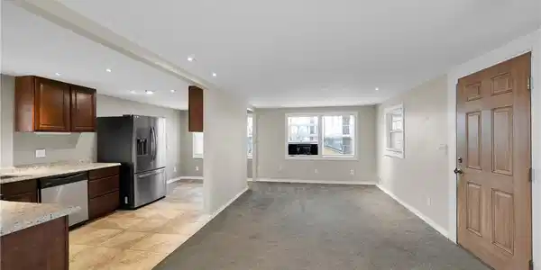 Image 3: View of Living Room/Kitchen