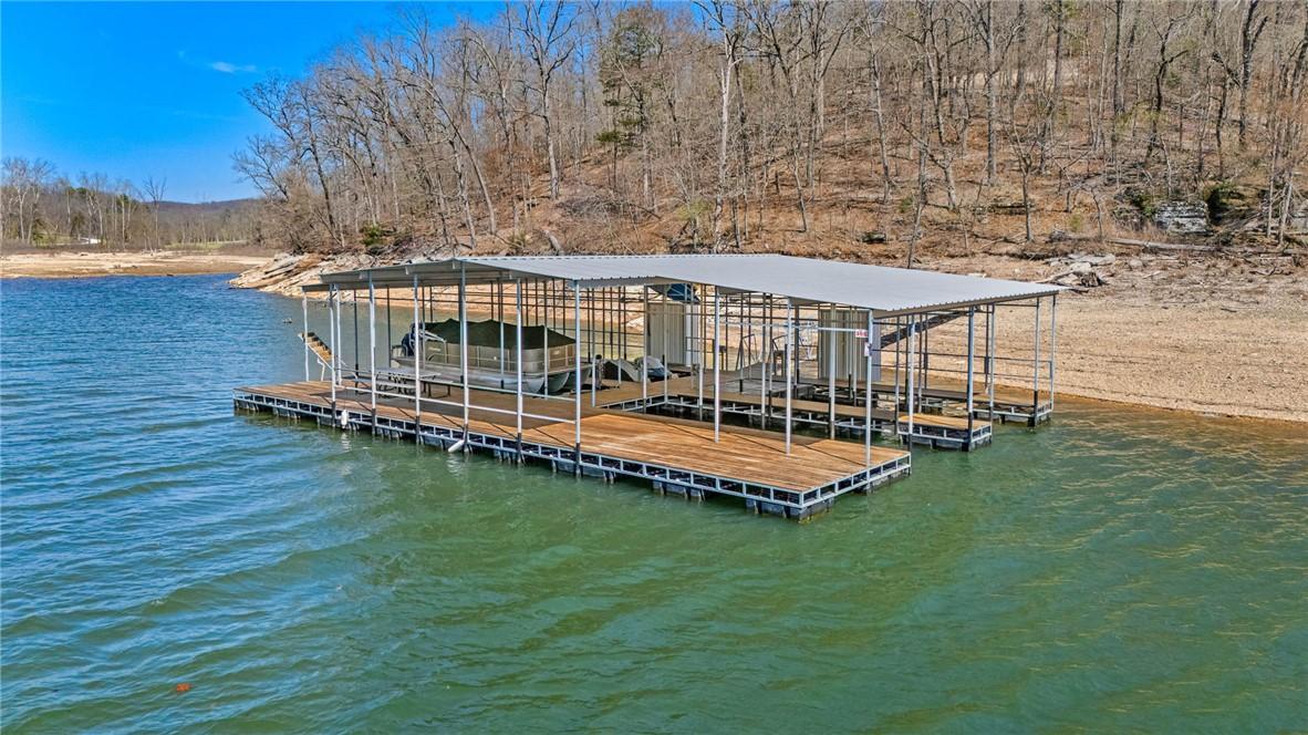 Image 3: Private boat dock featuring four 10'x30' slips, hu
