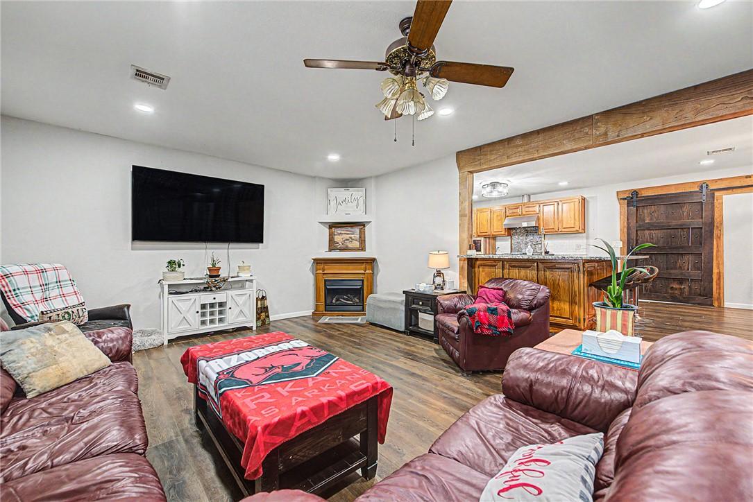 Image 4: Living area featuring wood-finish flooring, recess