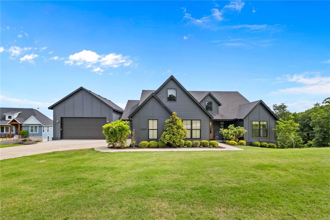 Image 2: Modern dark gray exterior with black window frames