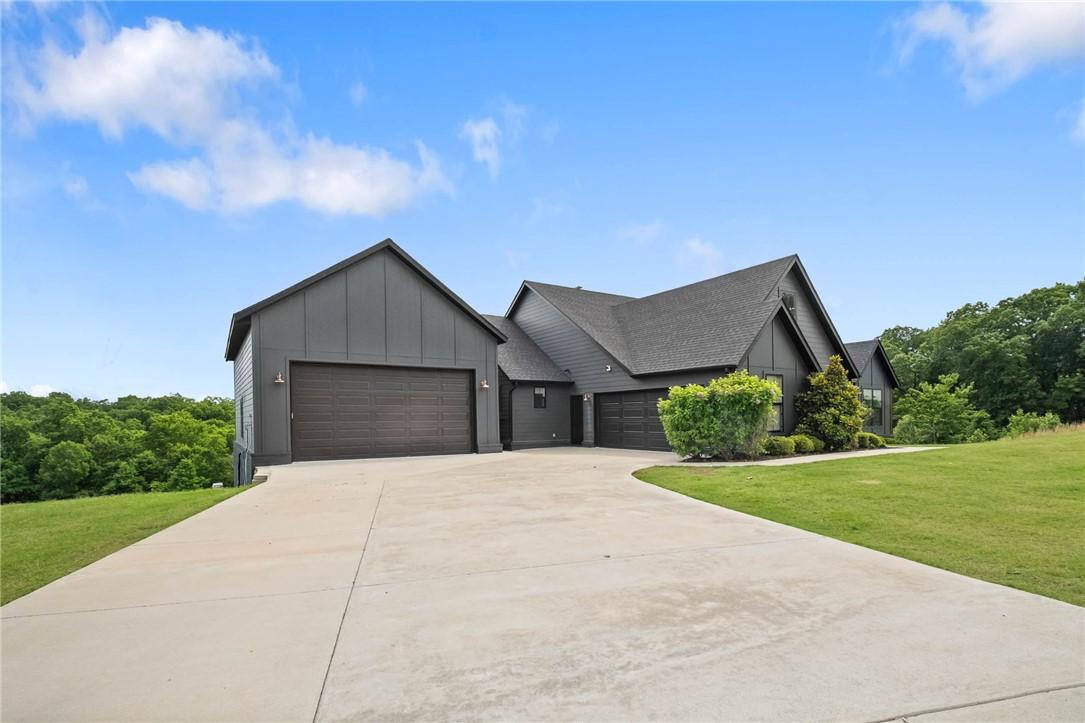 Image 4: Contemporary dark-toned exterior featuring multipl