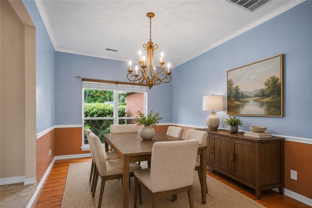 Image 4: Dining area featuring wood-finish flooring, a deco
