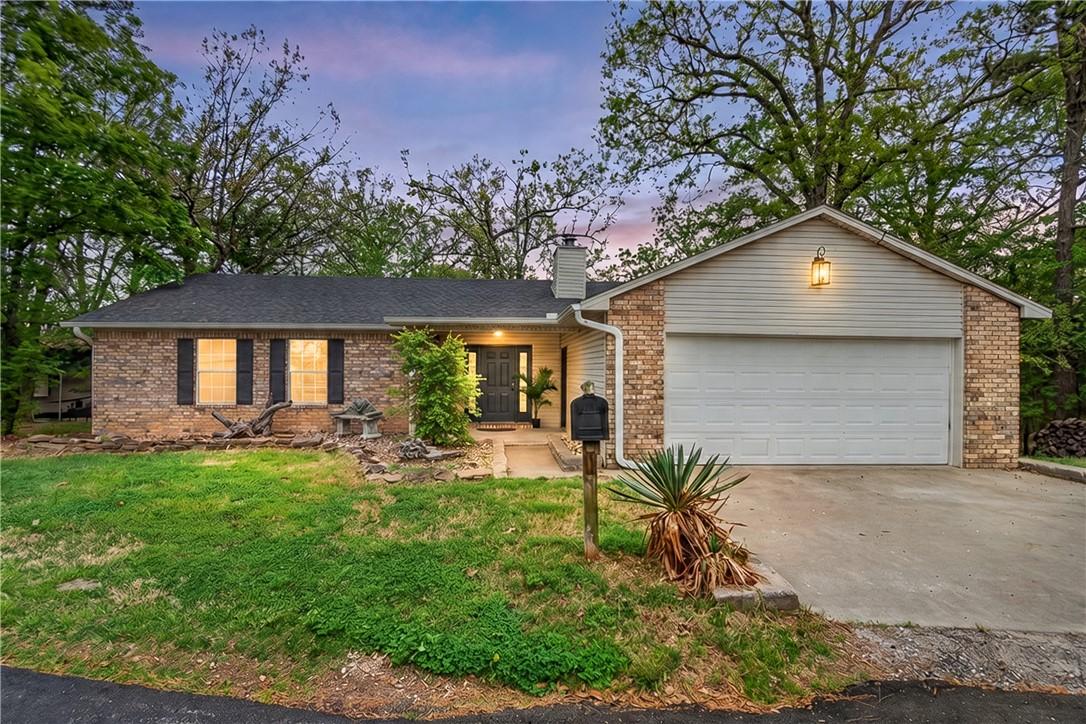 Image 2: Home features a brick exterior, (NEW) dark shingle