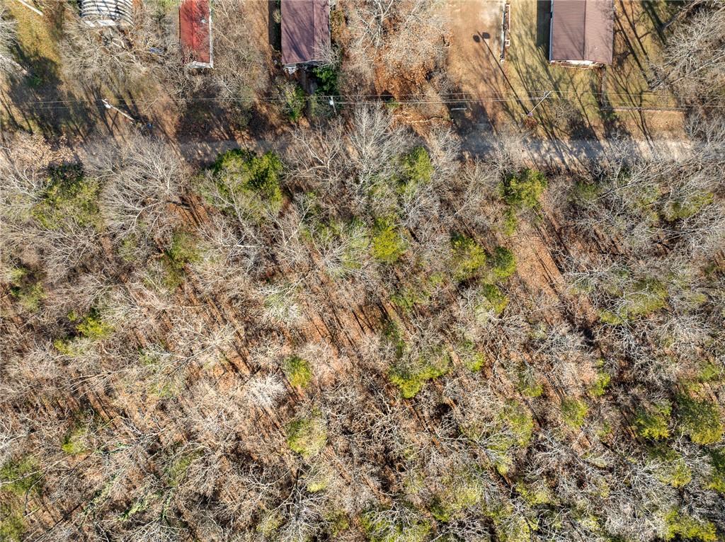 Image 2: Expansive wooded property featuring mature trees a
