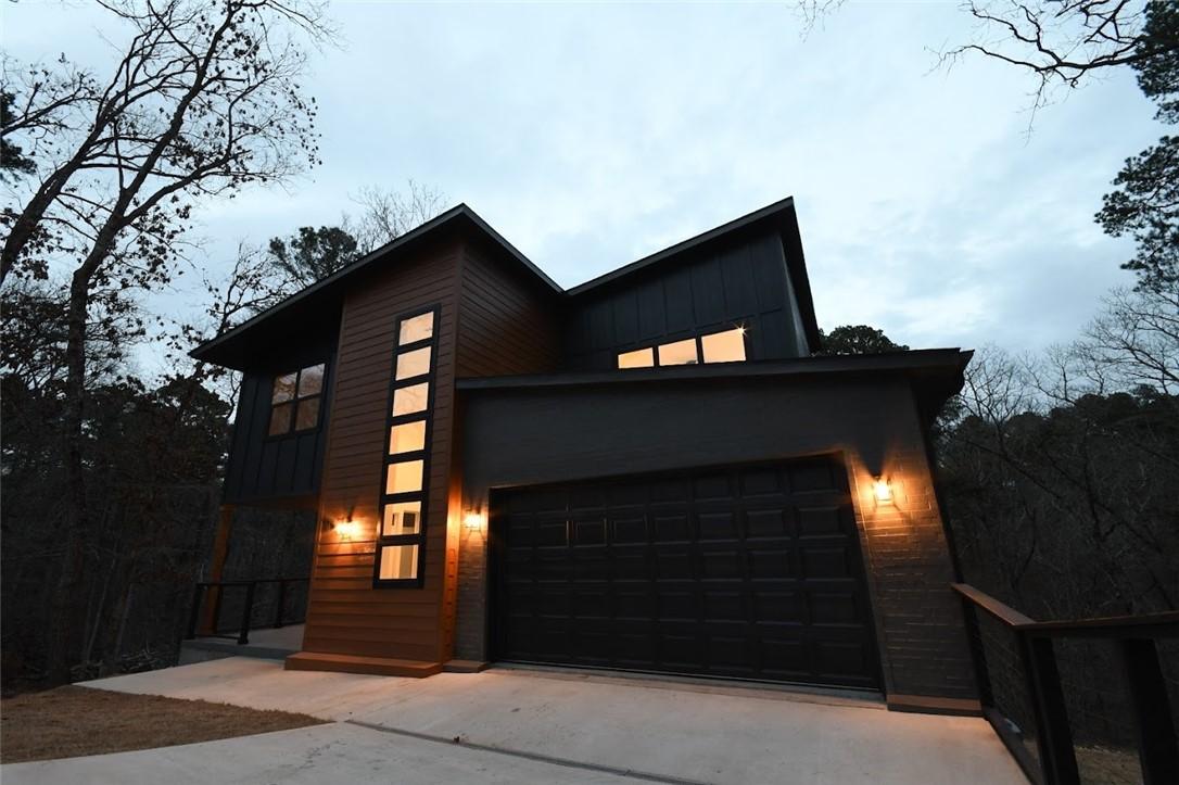 Image 2: Modern home with board and batten siding, an attac