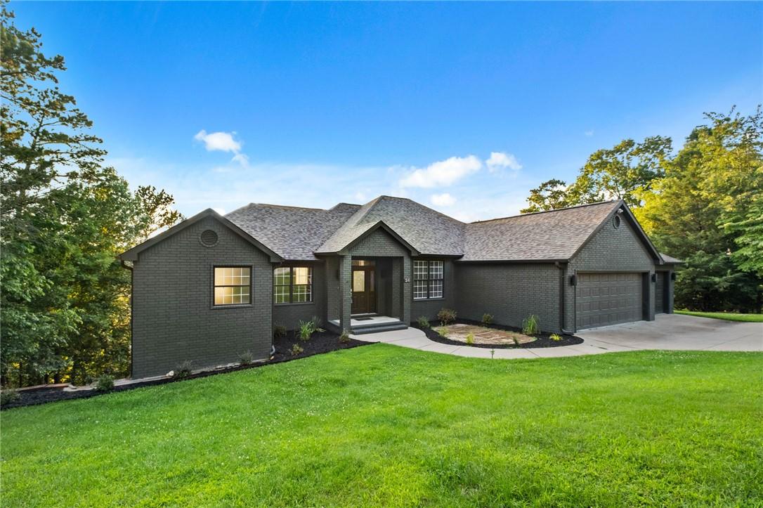 Image 4: Contemporary-style residence featuring a dark bric