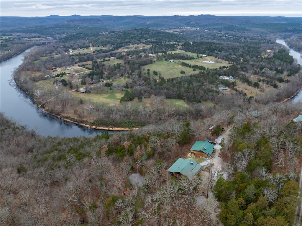 Image 3: Aerial overview of property's location with a wate