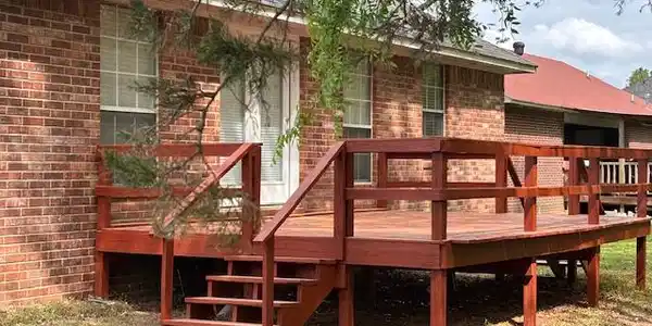 Image 3: Deck with a lawn and stairway
