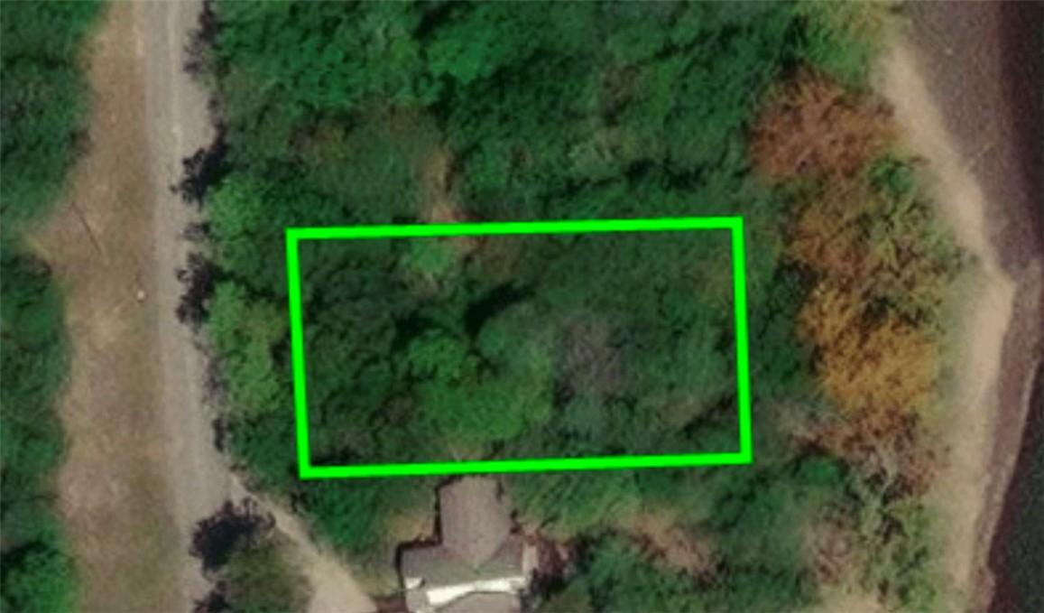 Image 4: nice lot with lake front on Sailboat Dr.