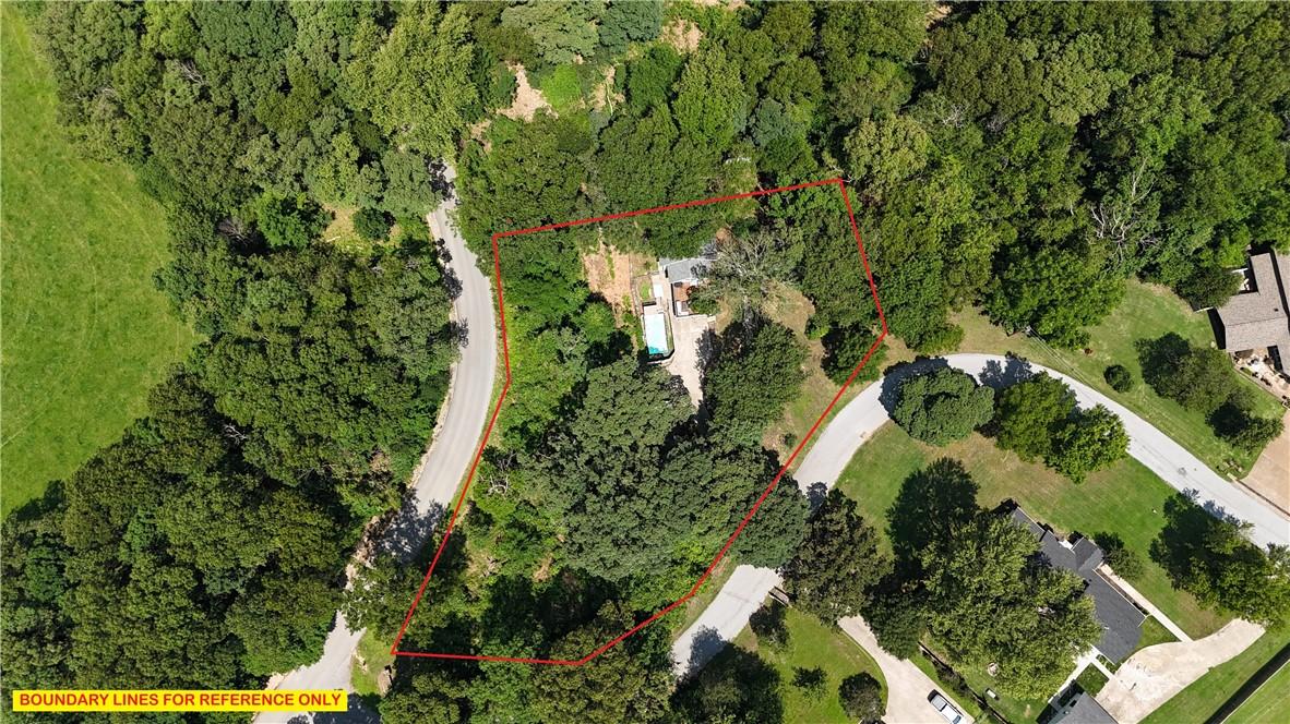 Image 3: Aerial shot showing .98 acre lot