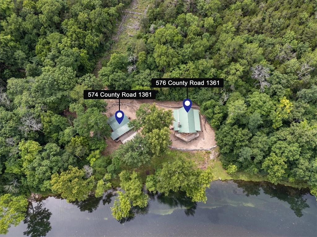 Image 2: Aerial perspective showcasing two properties situa
