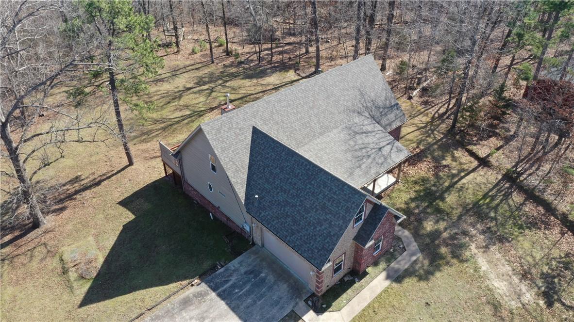 Image 4: Aerial view of property and surrounding area