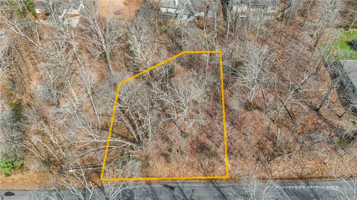 Image 3: Aerial view of property and surrounding area with