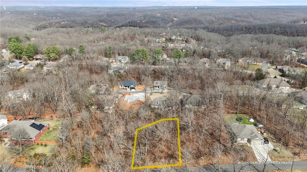 Image 4: Aerial perspective of suburban area featuring a fo