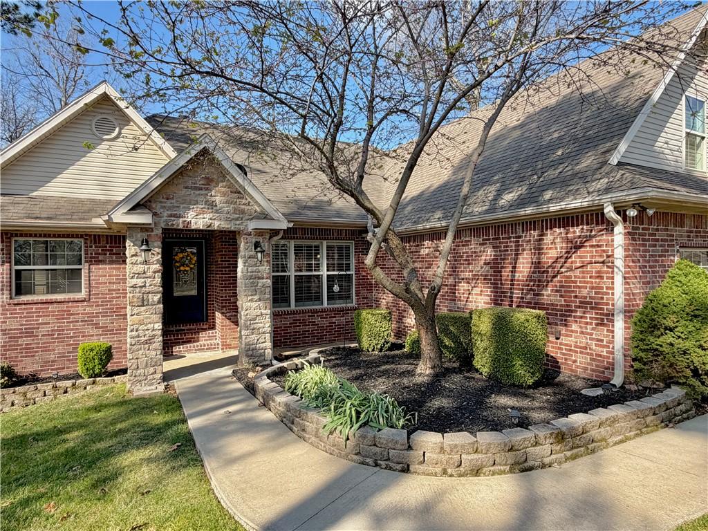 Image 2: View of front of house featuring a shingled roof a