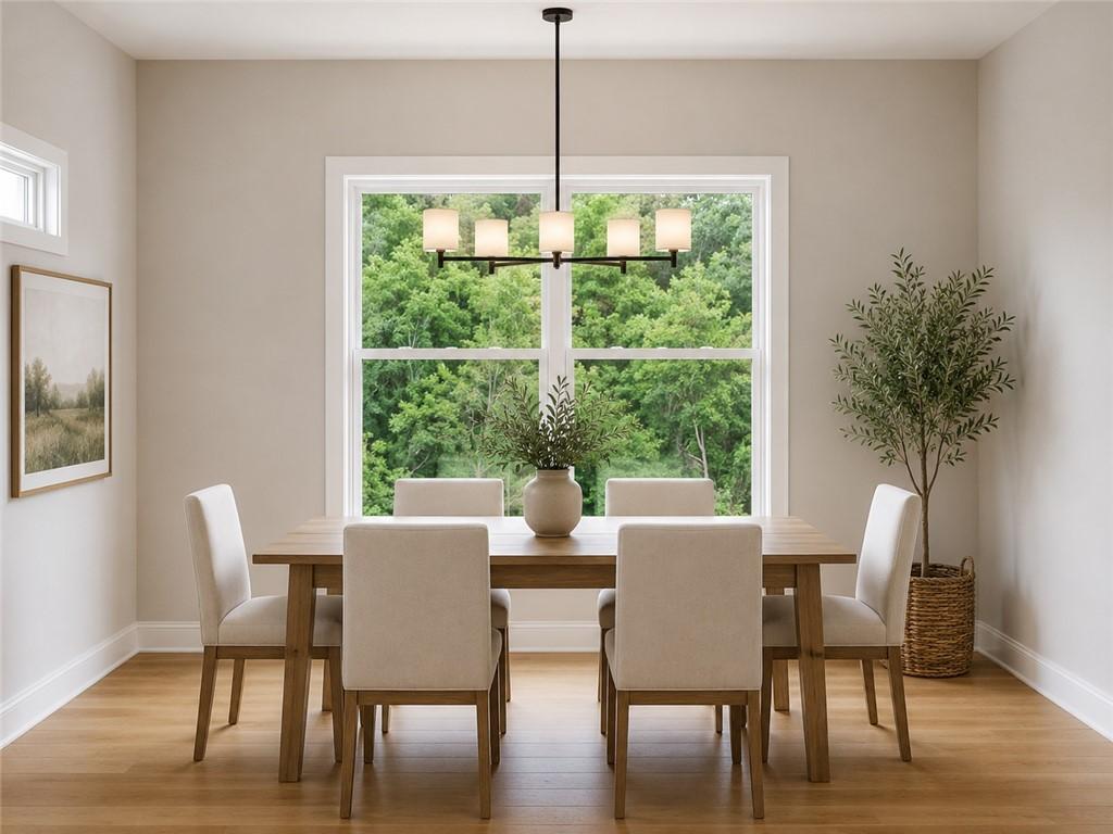 Image 3: Bright room featuring a large double-hung window,
