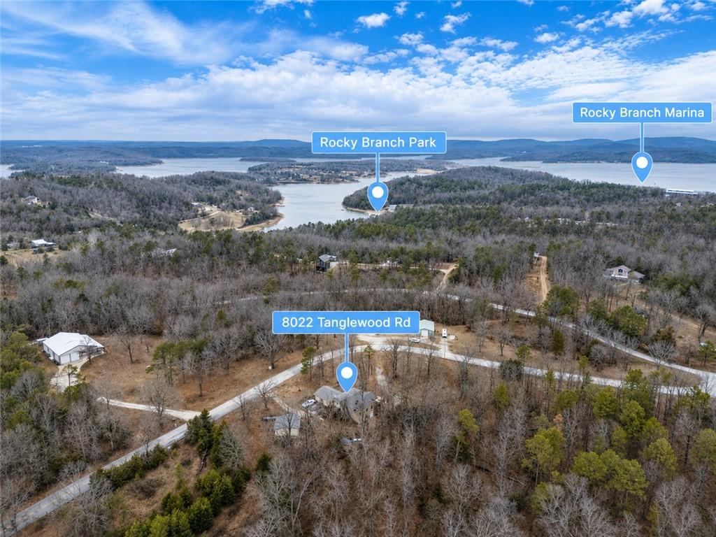 Image 2: Aerial of the house to the lake