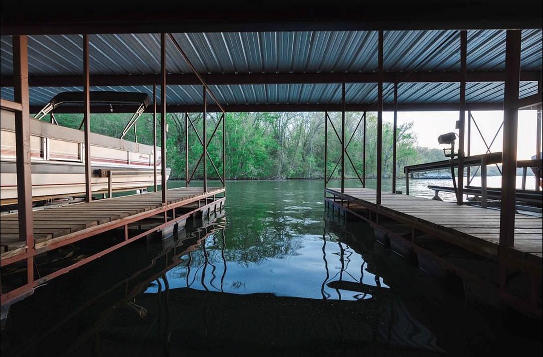 Image 2: Large community dock & swim platform. Slip #8 is 2