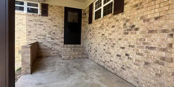 Image 2: Covered porch featuring concrete flooring