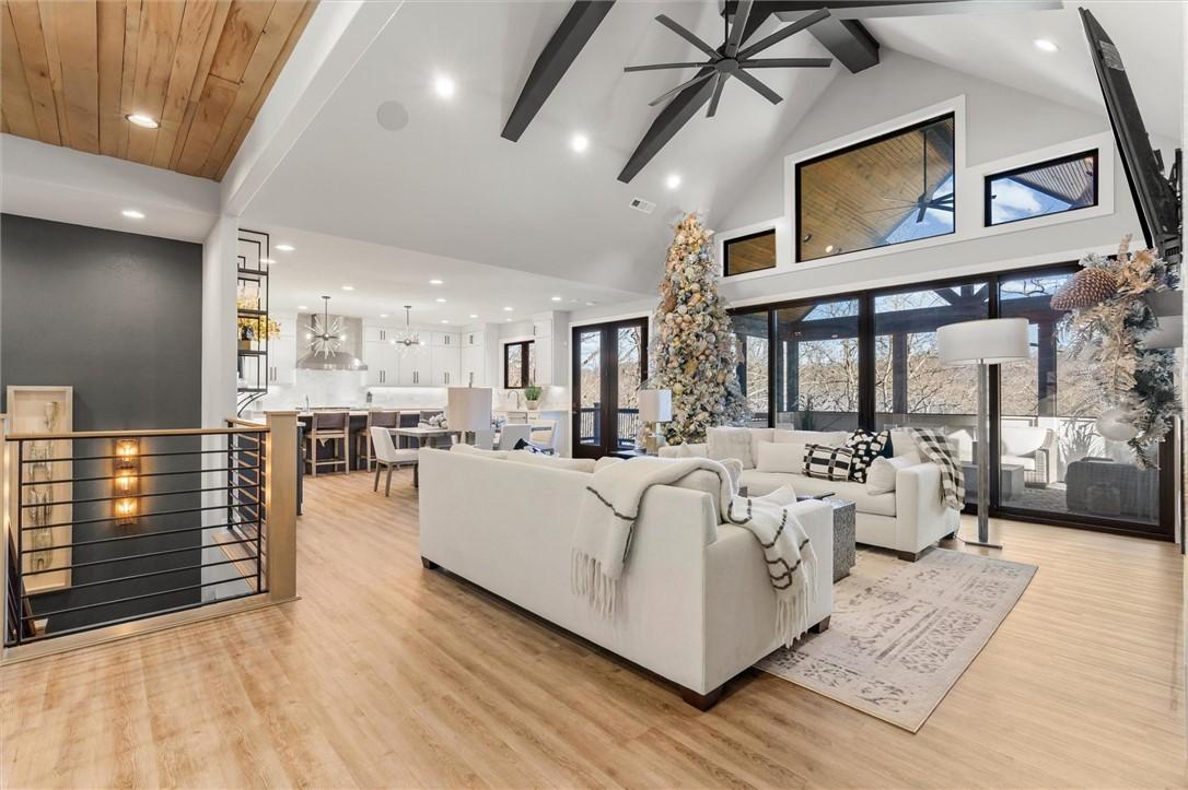 Image 3: Living area featuring light wood finished floors,