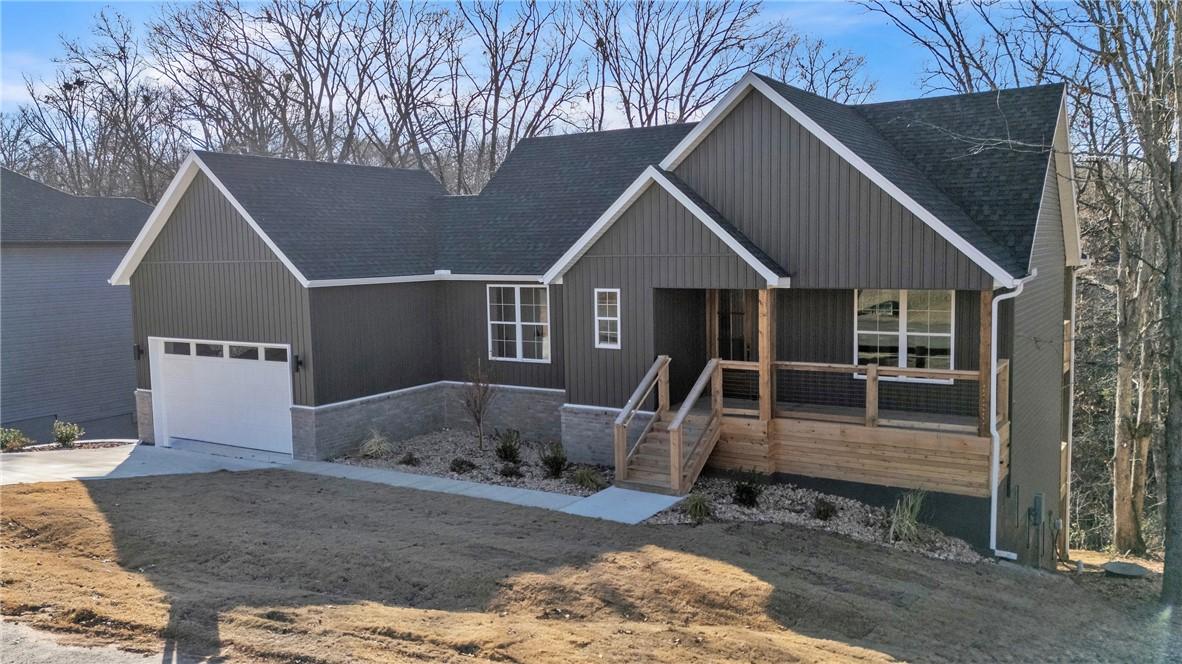 Image 2: Contemporary exterior featuring board and batten s