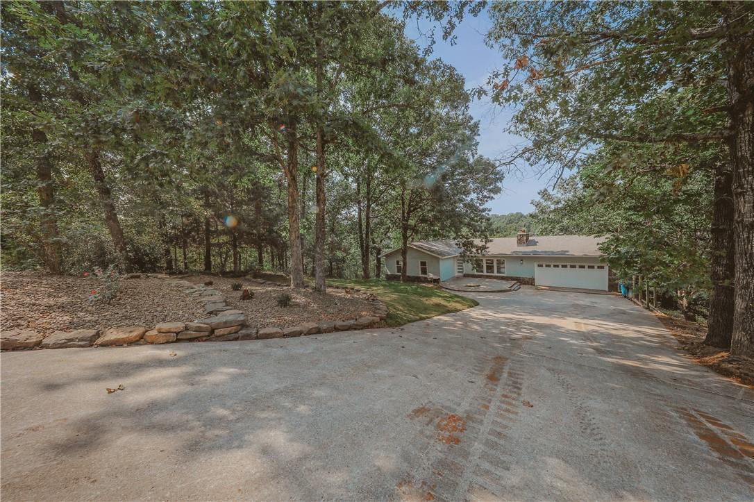 Image 3: Sits back from the street in a culdesac improving