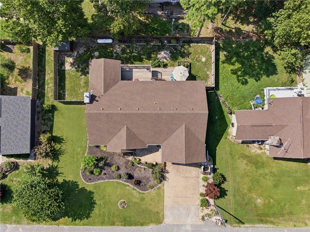 Image 4: Aerial view showcasing a residential property with