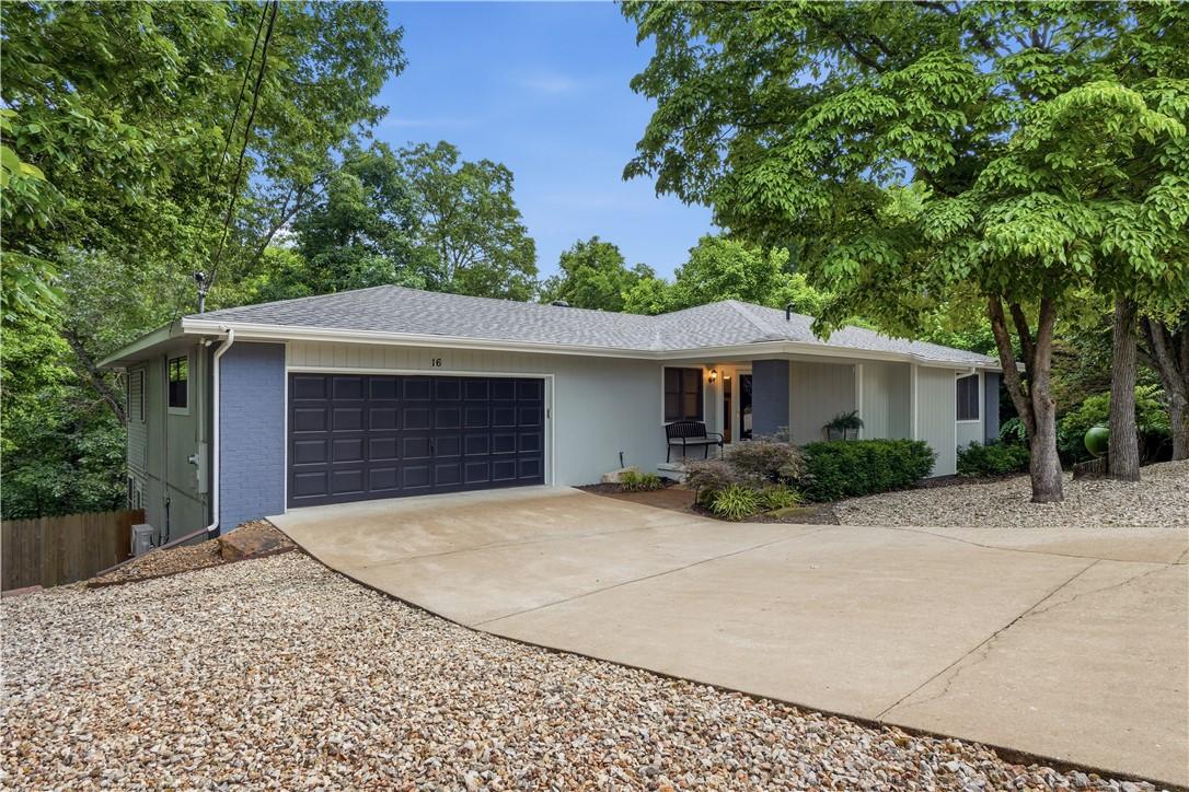 Image 2: Two-level residence featuring a two-car garage wit