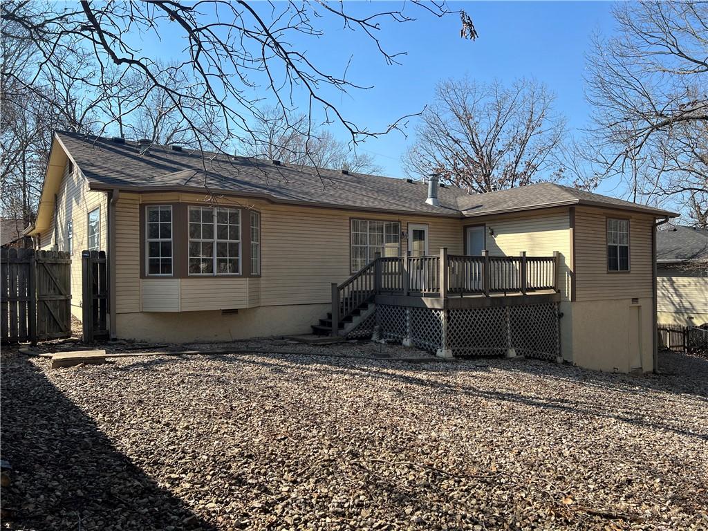 Image 3: Backyard featuring low maintenance landscape rock