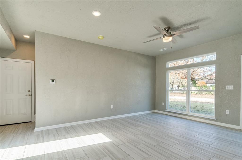 Image 4: Unfurnished room featuring ceiling fan and wood ti