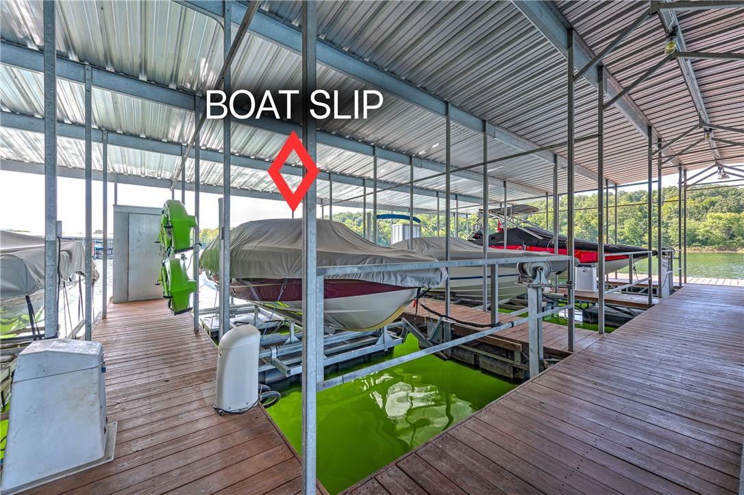 Image 2: Coveted boat slip with new lift (2024) and locker