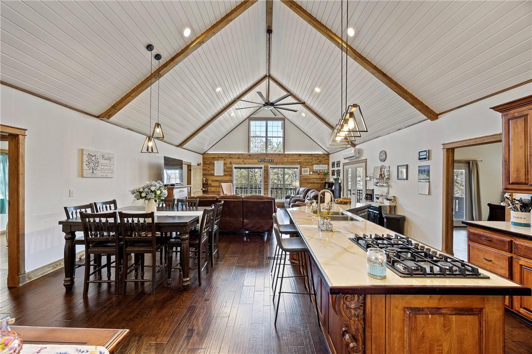 Image 2: Kitchen featuring a spacious island, open floor pl