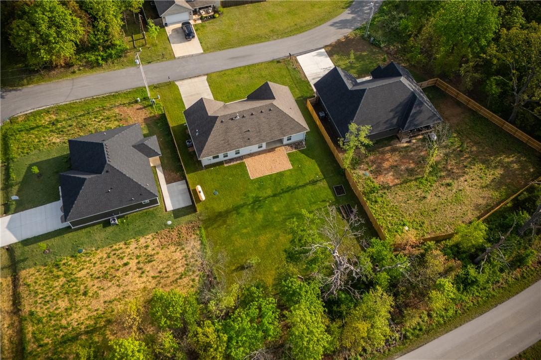 Image 4: Aerial perspective showcasing a single-story resid