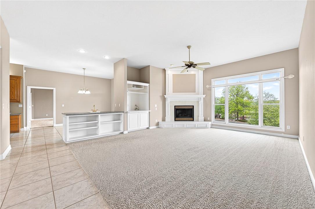 Image 4: Unfurnished living room with light carpet, ceiling
